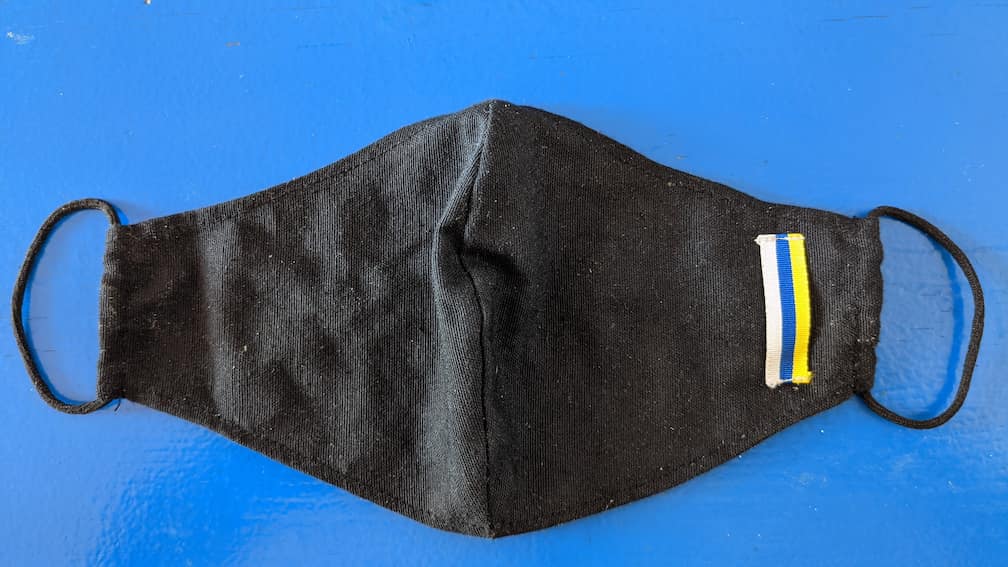 Canary flag in a handmade mask I bought on Guaza’s flea market, Tenerife.